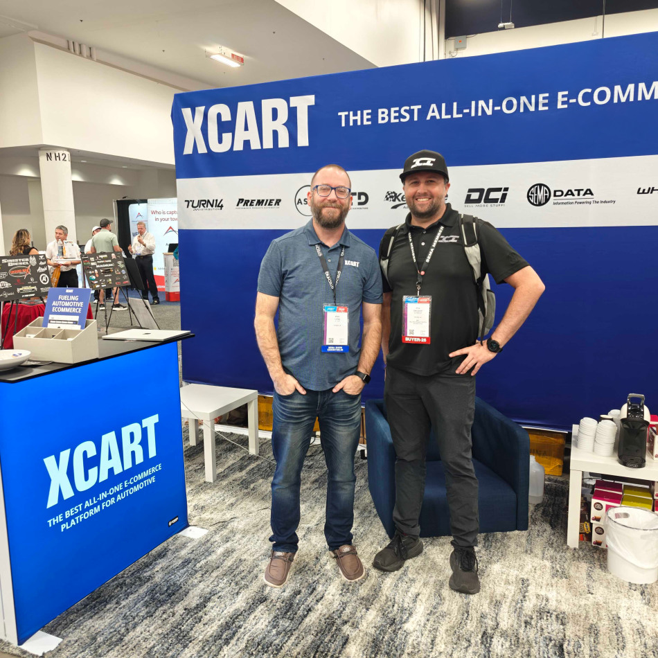Brad (X-Cart) and Kyle (ICI) in conversation at our SEMA booth